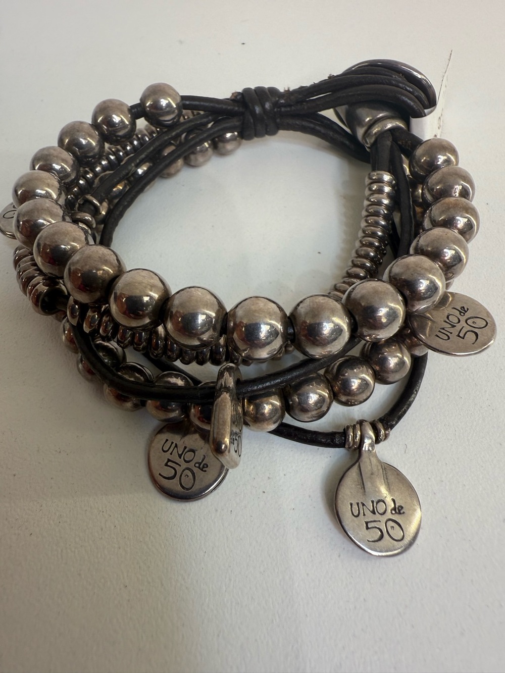 Uno De 50 5 strand leather small/large silver beads Bracelet